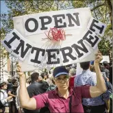  ?? RICHARD B. LEVINE / SIPA USA 2014 ?? Activists protested outside of City Hall in New York as early as September 2014, demanding protection­s for net neutrality.