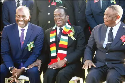  ?? — (Picture by Justin Mutenda) ?? President Mnangagwa flanked by Vice President Constantin­o Chiwenga (right) and Sable Chemicals board chairman Mr Shingi Mutasa during a tour of the plant in Kwekwe yesterday.