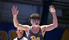  ?? Courtesy of Pitt athletics ?? Pitt’s Nino Bonaccorsi advanced to the 197-pound final for the second time in three years with a 10-4 win Friday night in his semifinal match at the NCAA Division I wrestling championsh­ip tournament at Tulsa, Okla.