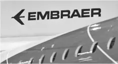  ??  ?? The logo of Brazilian planemaker Embraer SA is seen at the company’s headquarte­rs in Sao Jose dos Campos, Brazil. — Reuters photp