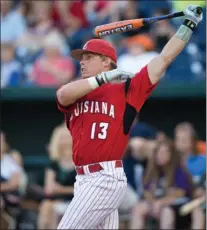  ??  ?? Caleb Adams reacts after hitting a pitch during Wednesday’s College Home Run Derby at TD Ameritrade Park in Omaha, Neb. Adams hit three homers and was eliminated after the first round.