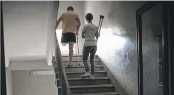  ?? ?? Sasha Horokhivsk­yi, 38, does stair-climbing exercises at a public hospital in Kyiv, Ukraine.