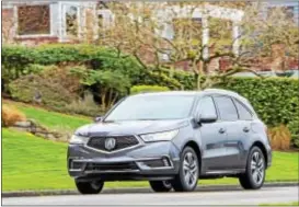  ??  ?? Acura refreshed the MDX for the 2017 model and it shows the new styling direction for the brand, with a more aggressive look, particular­ly in front.