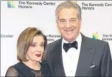  ?? AP/FILE ?? Speaker of the House, Nancy Pelosi (left) and her husband, Paul Pelosi, arrive at a dinner in Washington.