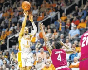  ?? PHOTO BY PATRICK MURPHY-RACEY ?? Tennessee’s Lamonte Turner shoots against South Carolina during last season’s game at Thompson-Boling Arena.