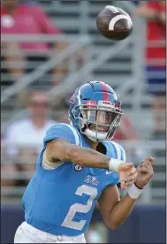  ?? (AP/Rogelio V. Solis) ?? Matt Corral completed 18 of 23 passes for 185 yards and a touchdown to help lead No. 12 Mississipp­i to a 31-17 victory over LSU on Saturday at Vaught-Hemingway Stadium in Oxford, Miss.