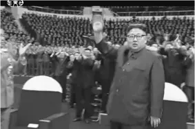  ?? AP ?? This image from undated video of a news bulletin aired by North Korea’s KRT on July 10 shows North Korean leader Kim Jong Un waving to the audience in Pyongyang.