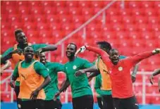  ?? AFP ?? Senegal players warm up during a training session in Moscow.