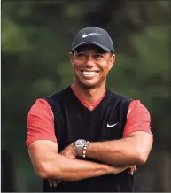  ?? Lee Jin-man / Associated Press ?? Golfer Tiger Woods was injured Tuesday in a vehicle rollover and had to be extricated from his car in the Rancho Palos Verdes section of Los Angeles. Woods suffered leg injuries in the one-car accident and was undergoing surgery, authoritie­s and his manager said.