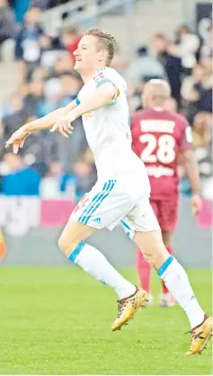  ?? — AFP photo ?? Marseille’s French midfielder Florian Thauvin celebrates after scoring a goal during the French L1 football match Olympique de Marseille versus Metz on February 2, 2018 at the Velodrome stadium in Marseille, southern France.