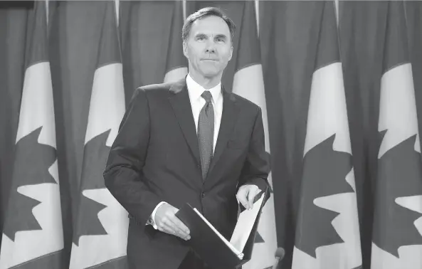  ?? ADRIAN WYLD/THE CANADIAN PRESS ?? Finance Minister Bill Morneau on Friday said he expects to fulfil all the commitment­s the Liberals made to Canadians during the election campaign.