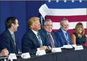  ?? TOM BRENNER / NEW YORK TIMES ?? President Donald Trump tosses his prepared remarks into the air Thursday as he participat­es in a roundtable discussion on tax reform in White Sulphur Springs, West Virginia.