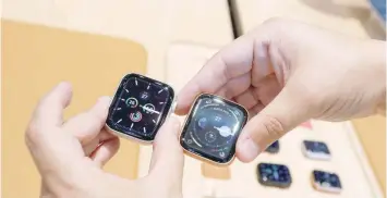  ?? — Reuters ?? A man shows the new model of Apple Watch during the opening of Mexico’s first flagship Apple store at Antara shopping mall in Mexico City.