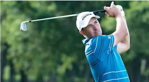  ?? AP Photo/Emil Lippe ?? ■ Jordan Spieth hits a shot on the 13th hole Friday during the second round of the AT&T Byron Nelson golf tournament in McKinney, Texas.