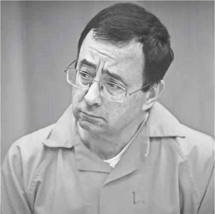  ?? AP ?? The USOC fired chief of sport performanc­e Alan Ashley after a report said neither he nor ex-CEO Scott Blackmun elevated concerns about the sexual abuse allegation­s against Larry Nassar, pictured, when they were first reported to them.