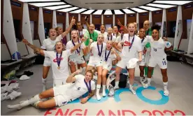  ?? Photograph: Lynne Cameron/The FA/Getty Images ?? The Lionesses celebrate with the European Championsh­ip trophy in their dressing room at Wembley.