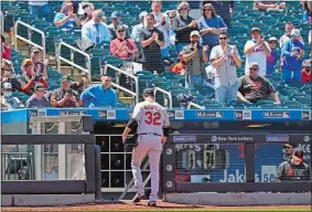  ?? KATHY WILLENS/AP PHOTO ?? Fans stand and applaud Orioles starting pitcher Matt Harvey as he leaves the mound during the fifth inning of Wednesday’s game at Citi Field, where Harvey’s former team, the New York Mets, beat the former Fitch HIgh great and the Orioles 7-1.