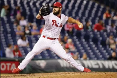  ?? CHRIS SZAGOLA — THE ASSOCIATED PRESS ?? Phillies lefty Adam Morgan struggled as a starter, but Pete Mackanin would prefer him to remain. he’s found a prosperous second life in the bullpen, where manager