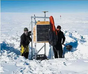  ??  ?? In-depth study: Scientists setting up equipment on the Totten Glacier to measure glacial flow speed and surface elevation. — AFP