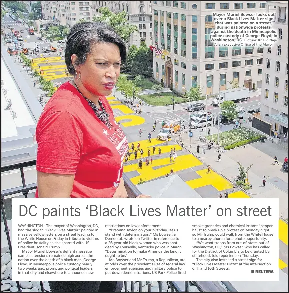  ?? Picture: Khalid NajiAllah Executive Office of the Mayor ?? Mayor Muriel Bowser looks out over a Black Lives Matter sign that was painted on a street, during nationwide protests against the death in Minneapoli­s police custody of George Floyd, in Washington, DC.