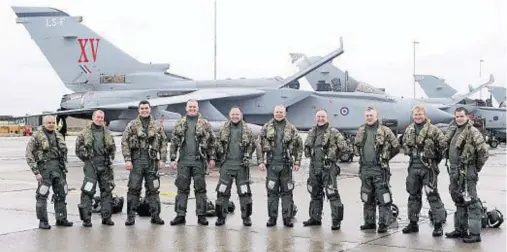  ??  ?? A DAY OF FAREWELLS: The five crews who took part in the final formal flying of XV (Reserve) Squadron at RAF Lossiemout­h yesterday