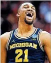  ?? SAM RICHE/TNS ?? Michigan’s Zak Irvin and the Big Ten may be getting the last laugh.
