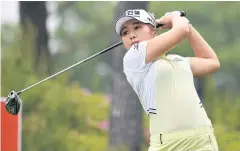  ??  ?? BELOW
Lee Jeong-Eun plays a shot at the KLPGA Championsh­ip.