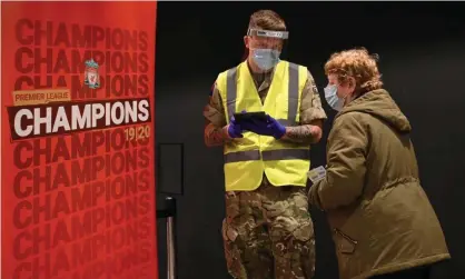  ??  ?? Soldiers operating a coronaviru­s test centre at Anfield stadium in Liverpool as part of a pilot mass testing programme, November 2020. Photograph: Oli Scarff/AFP/Getty Images