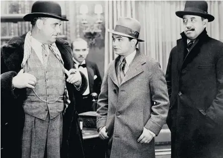  ?? WARNER BROS. ?? W.R. Burnett’s gangster classic Little Caesar — which was made into a 1931 movie starring Ralph Ince, left, Edward G. Robinson and Stanley Fields — is among five mystery novels that make up Leslie S. Klinger’s new compilatio­n Classic American Crime Fiction of the 1920s.