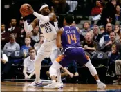  ?? ASSOCIATED PRESS ?? DALLAS MAVERICKS GUARD Wesley Matthews (23) looks to pass around Phoenix Suns guard De’Anthony Melton (14) during the first half of Wednesday’s game in Dallas. ASU: CAL: