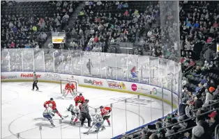  ?? AP PHOTO ?? In this January, 2018, photo, fans fill the Showare Center in Kent, Wash., about 20 miles south of Seattle, to watch a Western Hockey League game between the Seattle Thunderbir­ds and the Portland Winterhawk­s.