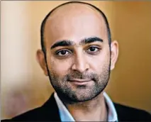  ?? DAVID LEVENSON/GETTY 2013 ?? “I think the notion that we are all migrants, the notion that migration does involve suffering ... relate to a kind of counter-tendency, which is to pretend otherwise: to pretend that we don’t suffer,” says Mohsin Hamid, author of “Exit West.”