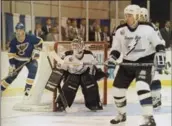  ?? ASSOCIATED PRESS FILE PHOTO ?? Tampa Bay Lightning goaltender Manon Rheaume watches the puck during her profession­al debut against the St. Louis Blues in 1992.