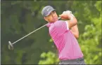  ?? Gregory Vasil / For Hearst Connecticu­t Media ?? Tony Finau hits a tee shot during the opening round of the 2019 Travelers.