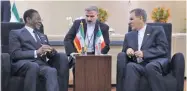  ??  ?? MEHDI QORBANI/IRNA Iranian Vice President Es’haq Jahangiri (R) speaks to Equatorial Guinea’s President Teodoro Obiang Nguema Mbasogo on the sidelines of the fourth summit of Gas Exporting Countries Forum (GECF) in Santa Cruz, Bolivia, on November 24,...