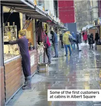  ??  ?? Some of the first customers at cabins in Albert Square