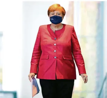  ?? FOTO: SCHMIDT/DPA ?? Kanzlerin Angela Merkel hatte schon Ende September vor stark steigenden Corona-Fallzahlen gewarnt.
