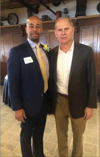  ?? SUBMITTED PHOTO ?? Norristown native Dana “Binky” Johnson poses with former Canisius coach John Beilein at the Canisius College Sports Hall of Fame induction ceremony.