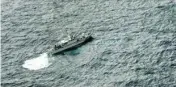  ?? PTI ?? In this aerial photo, Japan’s Coast Guard ship is seen at sea during a search operation