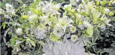  ?? Stichting Kunstboak ?? Dowling’s Fresh Linen bouquet is full of white flowers, including lilies, carnations, dahlias and freesias.