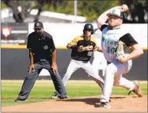  ?? Myung J. Chun Los Angeles Times ?? BASE UMPIRE Gary Bernstein looks on during a game between Thousand Oaks and Newbury Park on May 17.