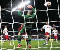  ??  ?? Power and the glory: Zlatan Ibrahimovi­c of Manchester United scores his team’s third goal