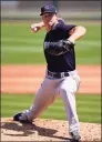  ?? Gene J. Puskar / Associated Press ?? Yankees starter Corey Kluber delivers during a spring training game against the Tigers on Tuesday.