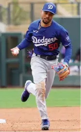  ?? ROSS D. FRANKLIN/AP ?? The Dodgers opted to move Mookie Betts from second base to shortstop less than two weeks before their regular-season opener in South Korea.