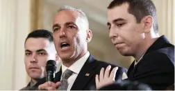  ?? PICTURE: AP ?? SPEAKING OUT: Andrew Pollack, father of slain Marjory Stoneman Douglas High School student Meadow Jade Pollack, joined by his sons, speaks during a listening session with President Donald Trump, high school pupils, teachers and others in the State...