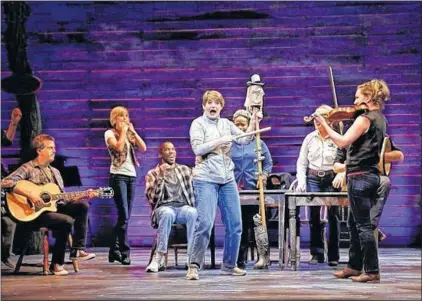  ?? SUBMITTED PHOTO BY CHRIS BENNION ?? A scene from the award-winning Broadway musical “Come From Away,” featuring Newfoundla­nd actor Petrina Bromley (centre).