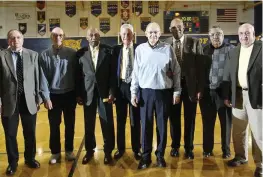  ?? STAFF FILE ?? Surviving members of the 1950 Springfiel­d High School state championsh­ip boys basketball team were honored in 2008 at the South Hall of Fame induction ceremony. From left, Richard Freed, Bill Mckaig, Bob Hutchins, Bill Goettman, Earl Fritts, Crystal “Boo” Ellis, Robert Bronston, and Joe Cahoon.