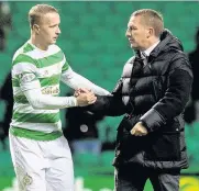  ??  ?? NO SLIPPING Rodgers and Griffiths at the final whistle
