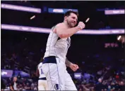  ?? ?? The Dallas Mavericks’ Luka Doncic celebrates his basket against the Golden State Warriors in the fourth quarter at Chase Center in San Francisco on Sunday, Feb. 27. Doncic and the Mavericks play the Warriors on Wednesday.