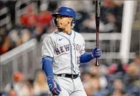  ?? Greg Fiume / Getty Images ?? Francisco Lindor of the Mets reacts after striking out in the eighth inning against the Nationals on Wednesday. Lindor was 0-for-4 in the game.